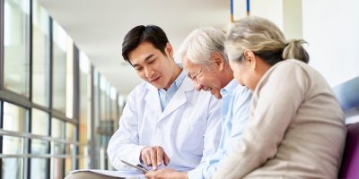Young,Asian,Doctor,Discussing,Test,Result,And,Diagnosis,With,Senior
